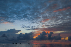 Rockjumper's 2017 Melanesia birding cruise group enjoy a sunset at Duff